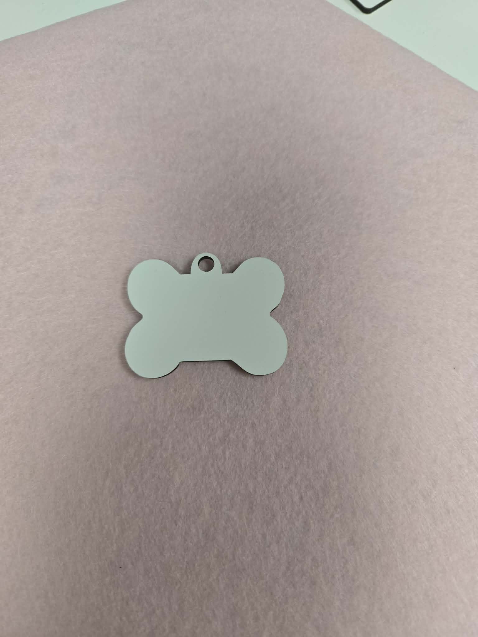 Bone shaped MDF keychain that can be personized with sublimation by Jennnayyy's.