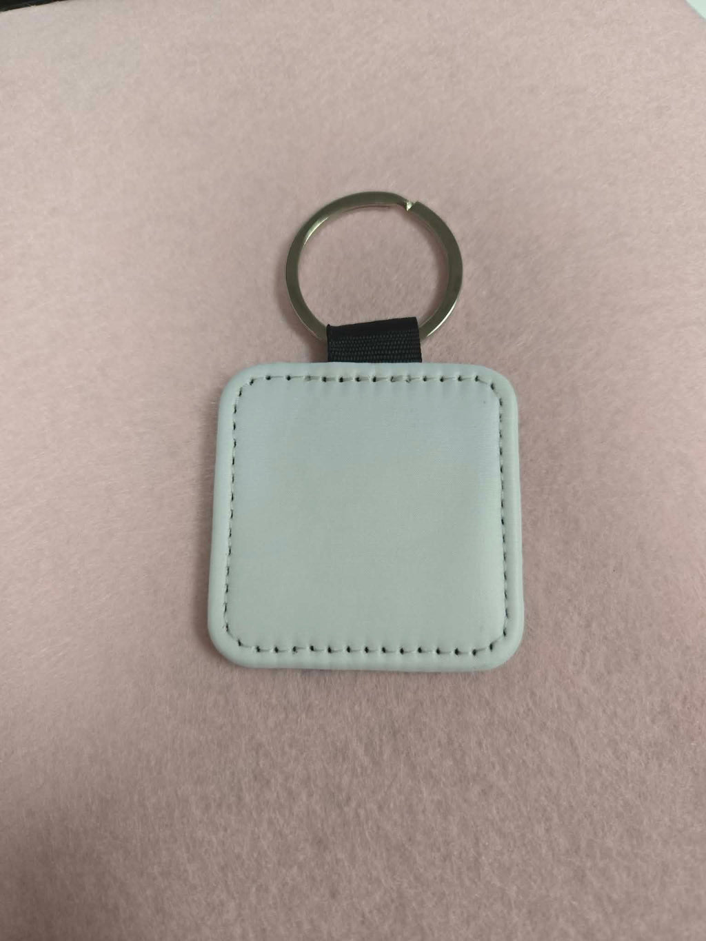 Leather Square shaped Keychain.  Customized with Sublimation by Jennnayyy's.
