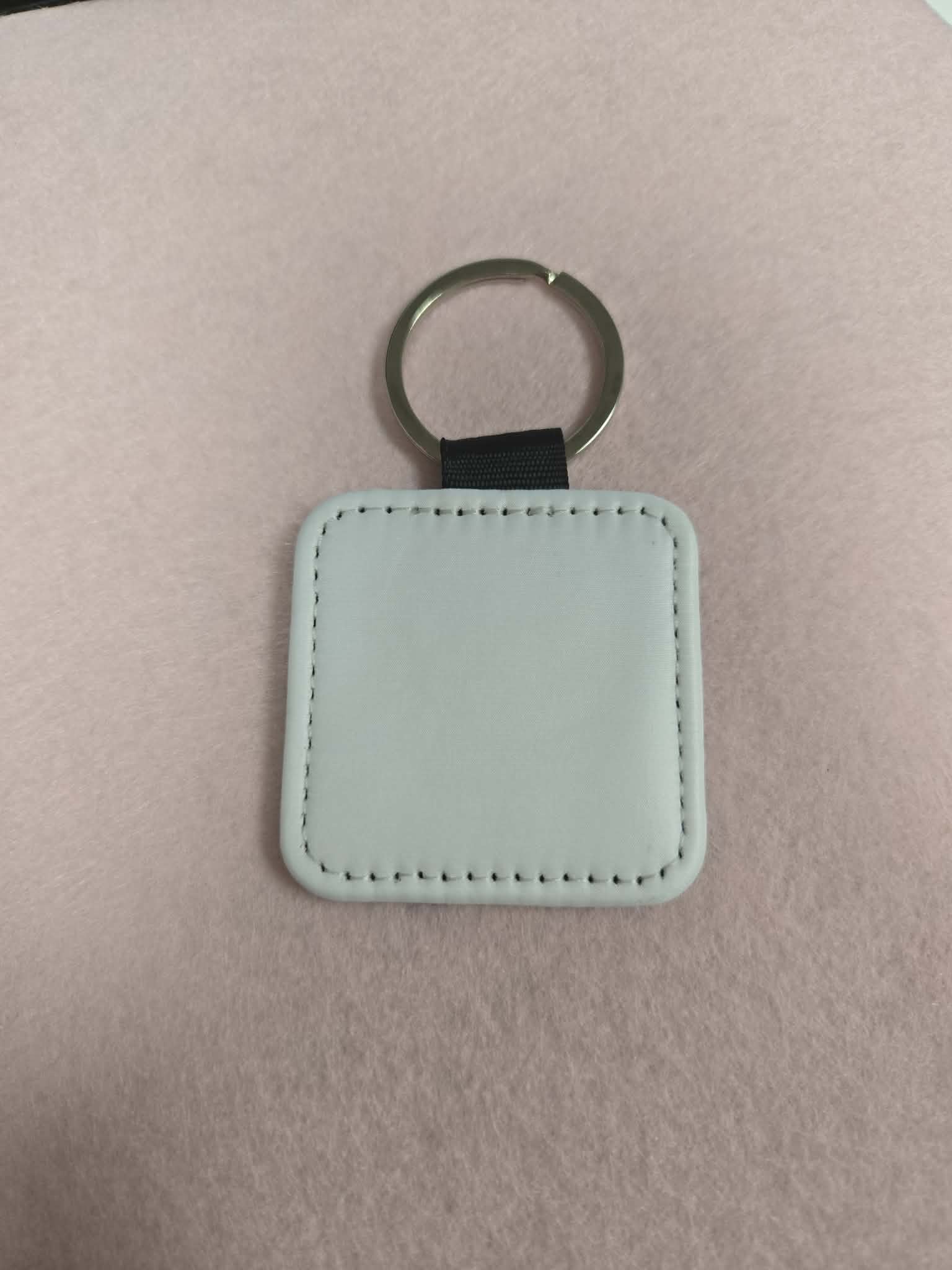 Leather Square shaped Keychain.  Customized with Sublimation by Jennnayyy's.